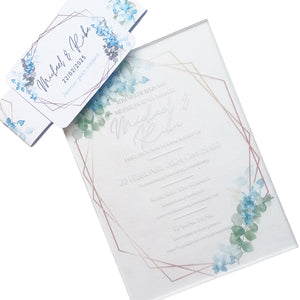 Elegant acrylic wedding invitations with floral design and geometric gold frame for modern weddings