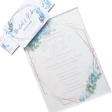 Elegant acrylic wedding invitations with floral design and geometric gold frame for modern weddings