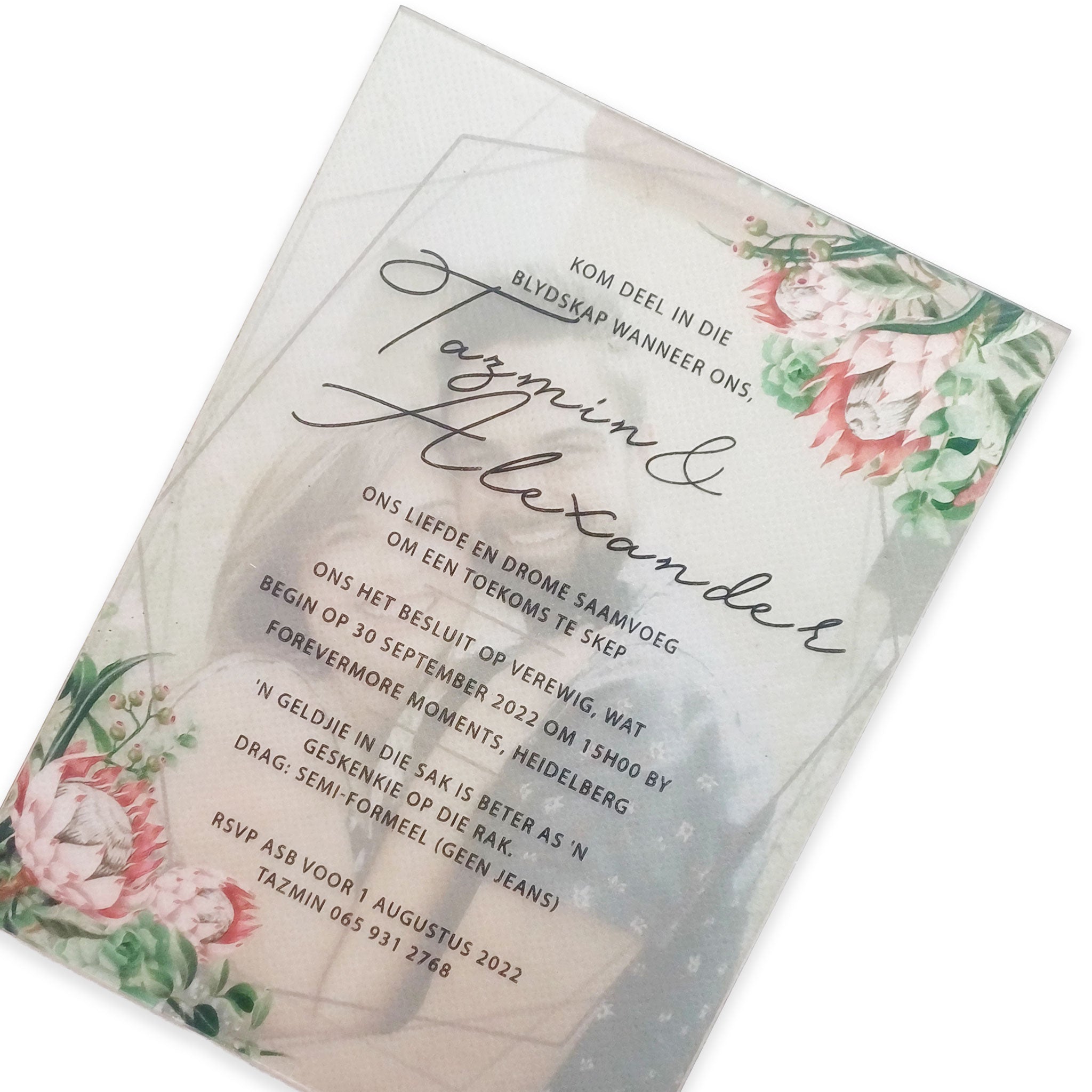 Elegant acrylic wedding invitations with floral design and cursive text by Forevermore Momentos