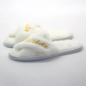 Bride and bridesmaid embroidered slippers in white fluffy material with gold lettering