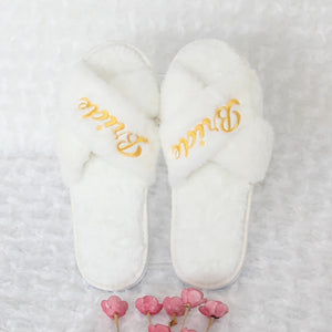 Bride and bridesmaid embroidered slippers in white with elegant gold lettering for wedding day comfort