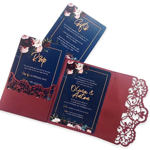 Elegant cardstock fold-open wedding cards with floral design and navy blue inserts by Forevermore Momentos