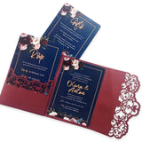 Elegant cardstock fold-open wedding cards with floral design and navy blue inserts by Forevermore Momentos