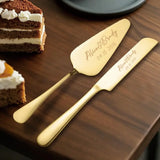 Elegant custom engraved cake knife set with personalized names and date on a wooden table