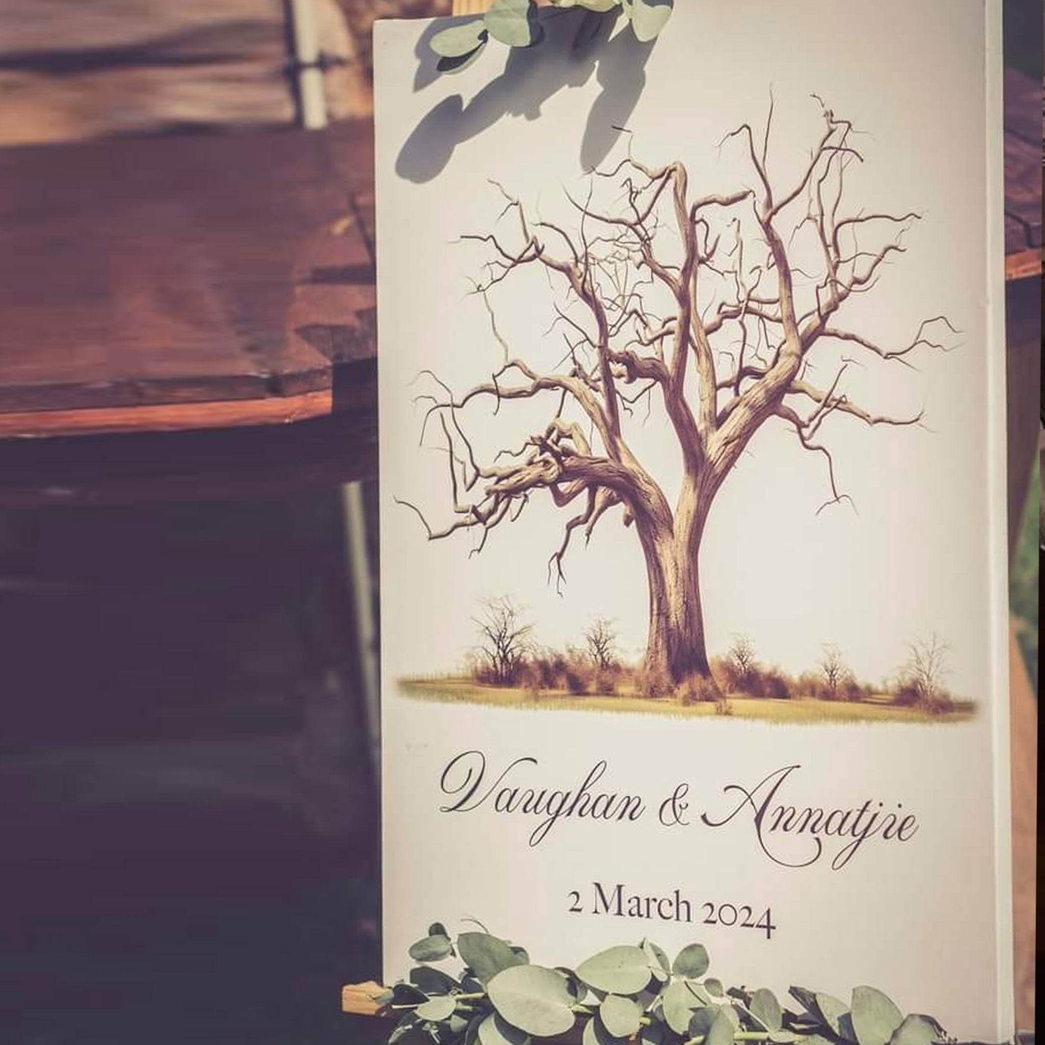 Forevermore Momentos custom fingerprint guest book with tree design and personalized names.