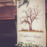 Forevermore Momentos custom fingerprint guest book with tree design and personalized names.