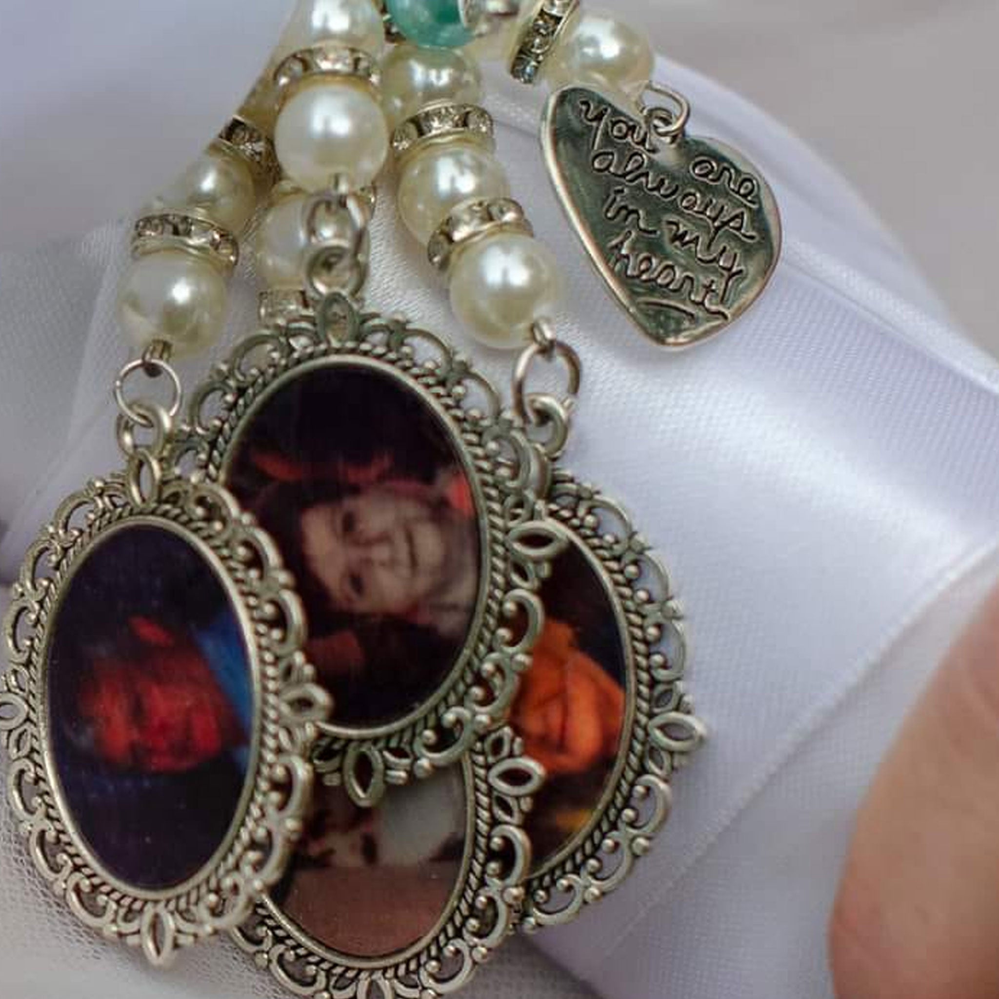 Custom wedding bouquet pendant with pearl beads and vintage-style photo lockets from Forevermore Momentos