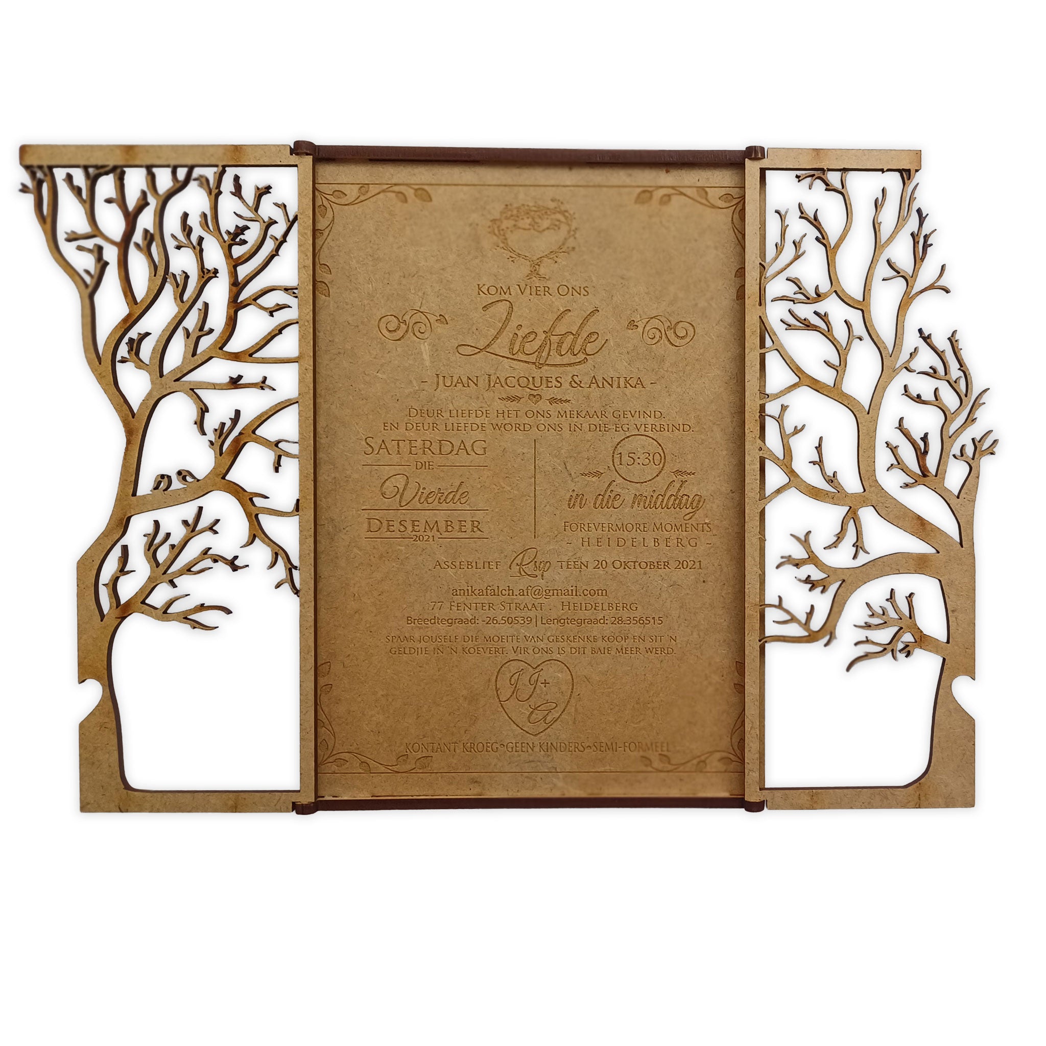 Elegant laser cut tree wedding invitation with intricate tree designs and rustic brown details