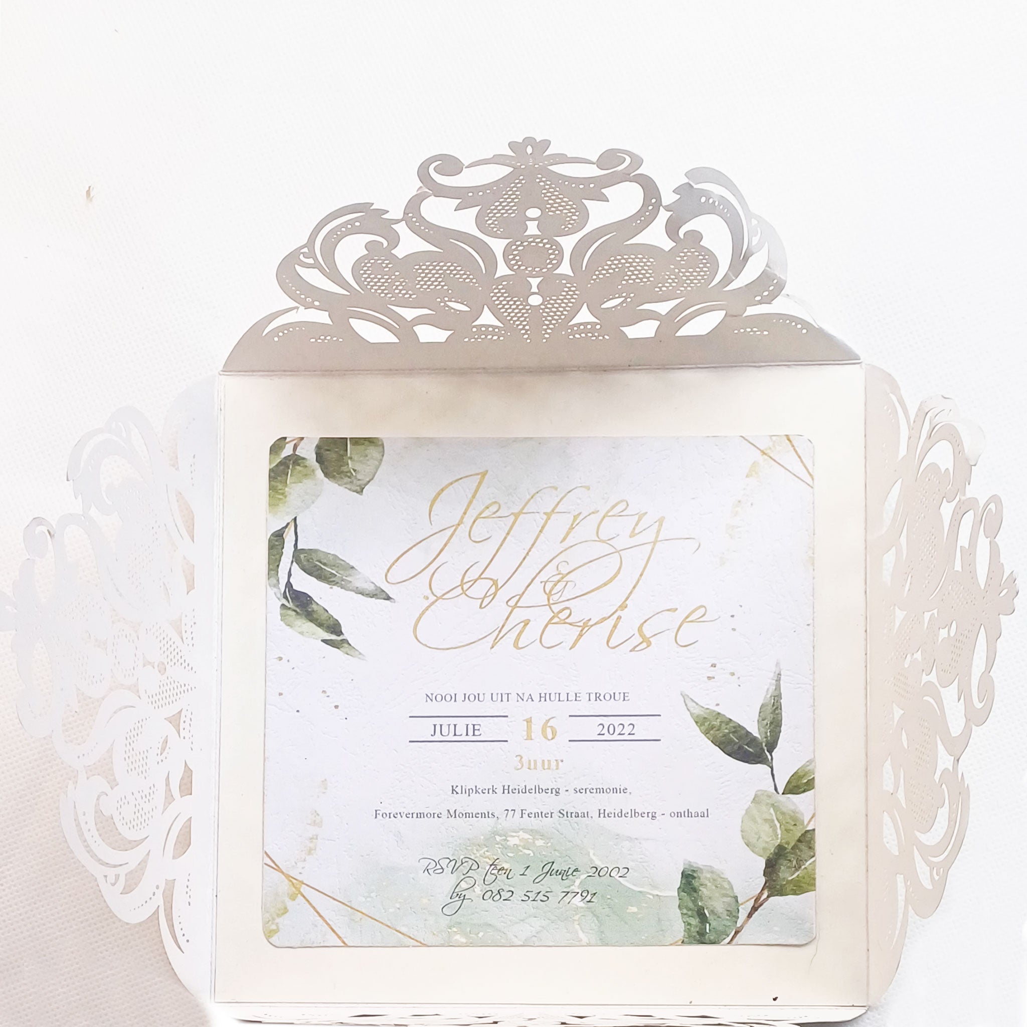 Elegant fold-open cardstock invitations with intricate lace design and botanical accents by Forevermore Momentos