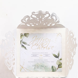 Elegant fold-open cardstock invitations with intricate lace design and botanical accents by Forevermore Momentos