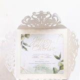 Elegant fold-open cardstock invitations with intricate lace design and botanical accents by Forevermore Momentos
