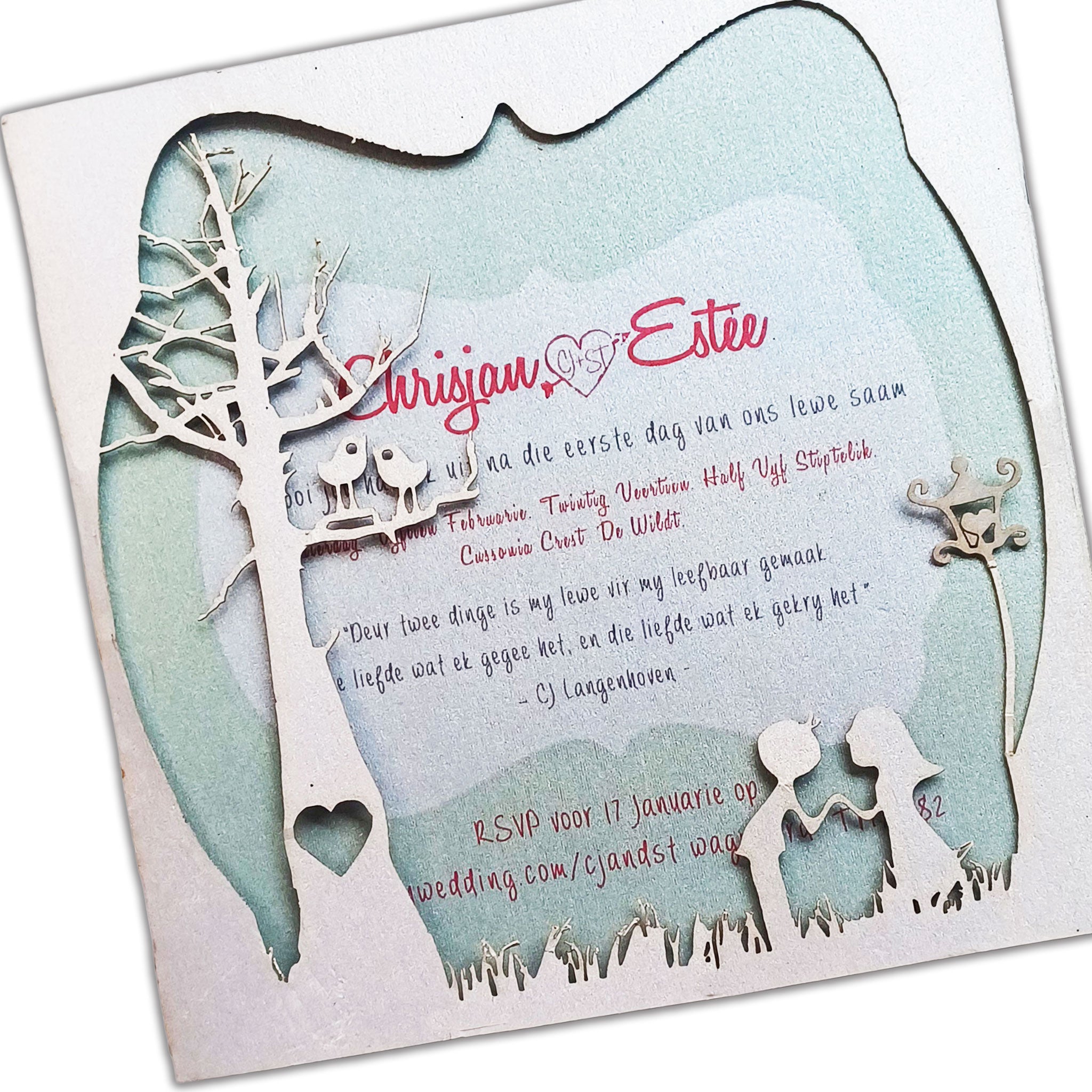Elegant laser cut wedding invitations with intricate tree and couple design in white and teal