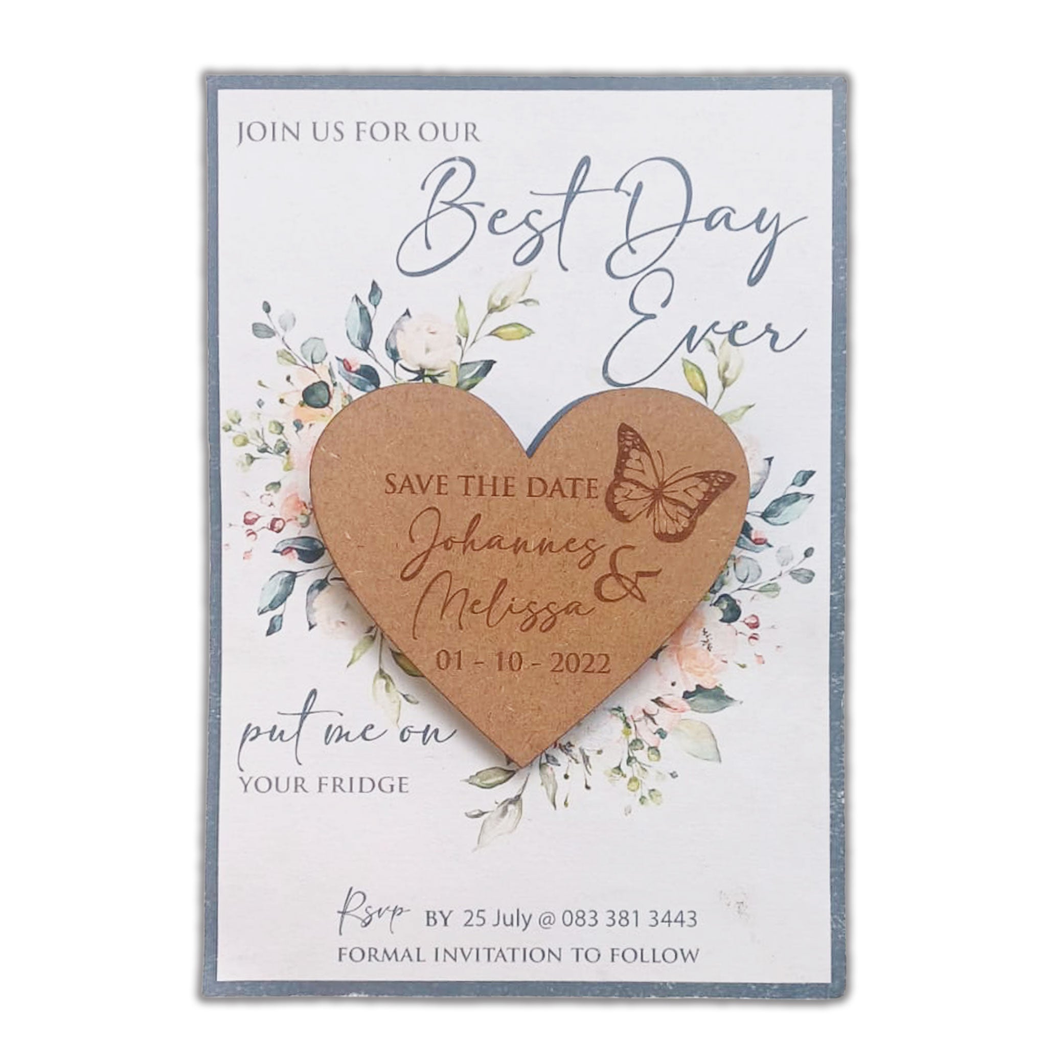 Laser-cut wooden heart magnet with save the date text and butterfly design on floral card