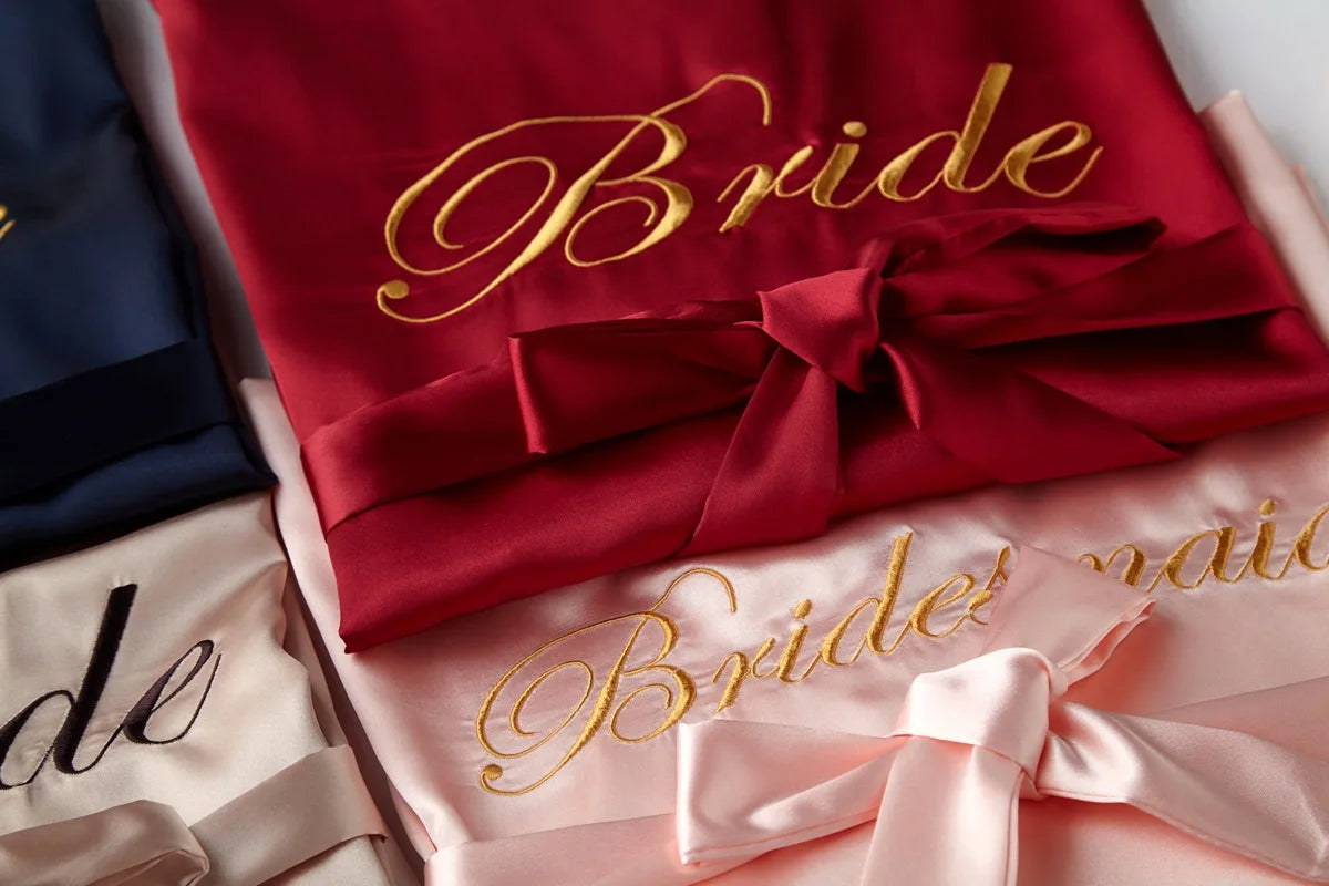 Personalized bridal party sleepwear in various colors with elegant embroidery for brides and bridesmaids