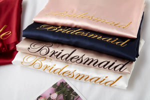 Personalized bridal party sleepwear in various colors with elegant embroidery for bridesmaids