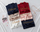 Personalized bridal party sleepwear set with elegant dresses in navy, red, and pink featuring Bride and Bridesmaid prints