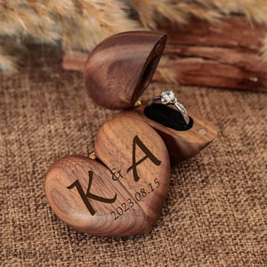 Personalized heart wood ring box crafted from high-quality wood, featuring initials and date engraving