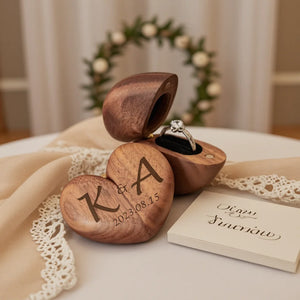 Personalized heart wood ring box with custom initials and date, perfect for special moments