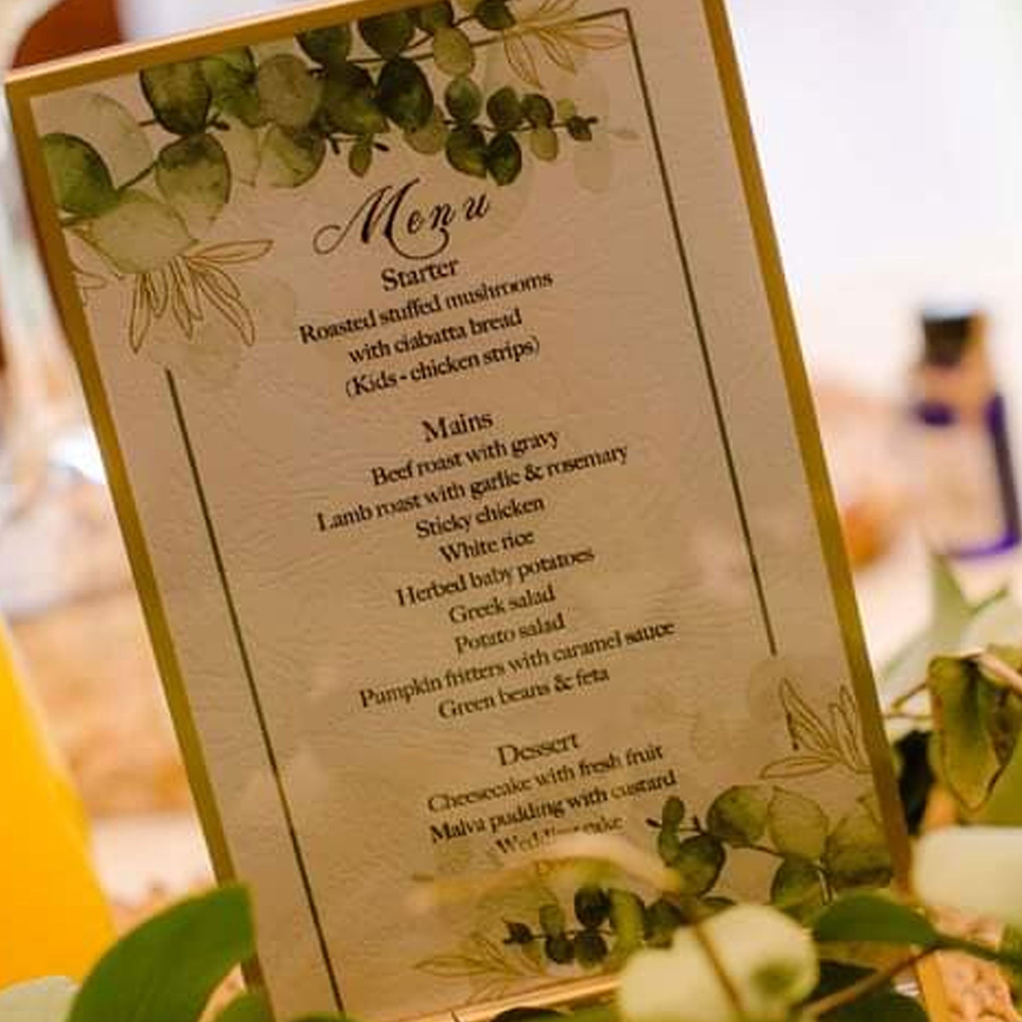 Elegant personalized menu digital file with green leaf design and detailed starter, mains, and dessert options