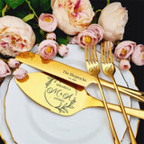 Elegant personalized wedding cake cutting set with gold utensils and floral accents for memorable celebrations