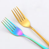 Personalized wedding cake cutting set featuring elegant rainbow stainless steel forks
