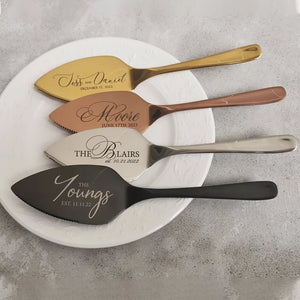 Elegant personalized wedding cake cutting set with custom engravings on four different serving utensils