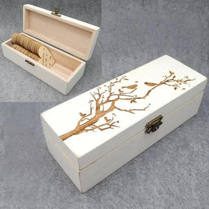 Personalized wooden wedding guest book with engraved tree design and heart-shaped message cards inside