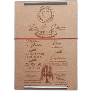 Laser cut willow tree wedding invitation in rustic brown with intricate nature-themed engraving