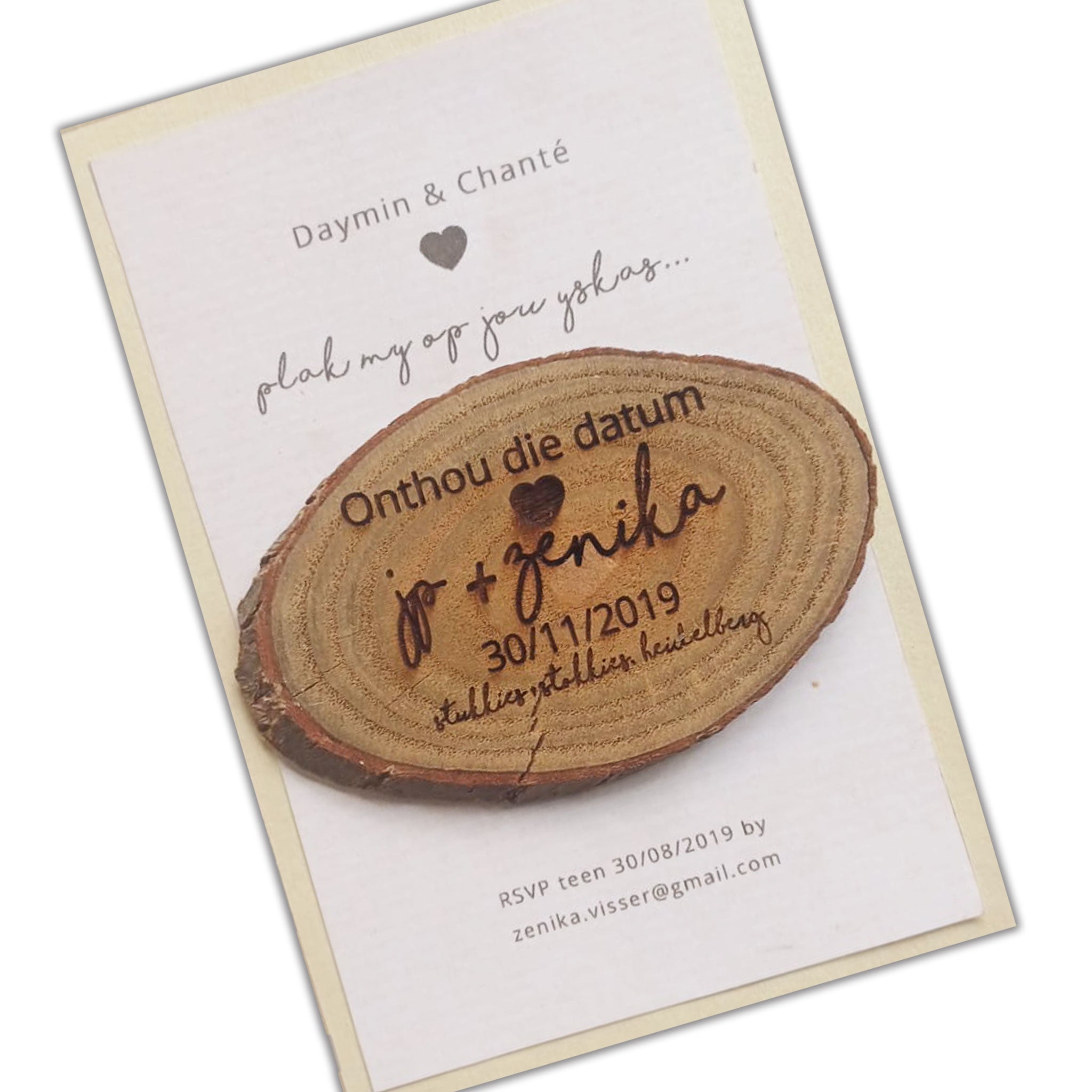 Rustic save the date magnets featuring wood slice design with personalized names and wedding date