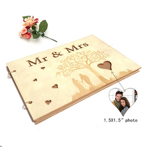 Rustic wood wedding guest book by Forevermore Momentos featuring engraved Mr and Mrs design