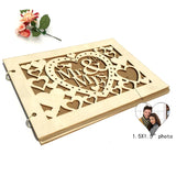 Rustic wood wedding guest book with heart design for guests to sign and add photos