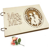 Rustic wood wedding guest book with Mr and Mrs design and floral cutout for timeless memories