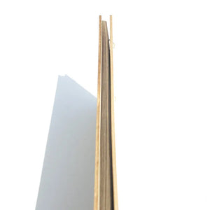 Rustic wood wedding guest book with a natural finish and sturdy binding, perfect for capturing memories