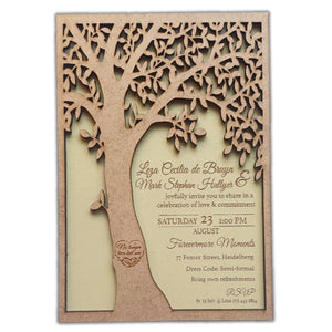 Elegant tree design wedding invitation with intricate laser-cut leaves and personalized text