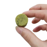 Hand holding a green smoke bomb prop, perfect for wedding party smoke bomb props