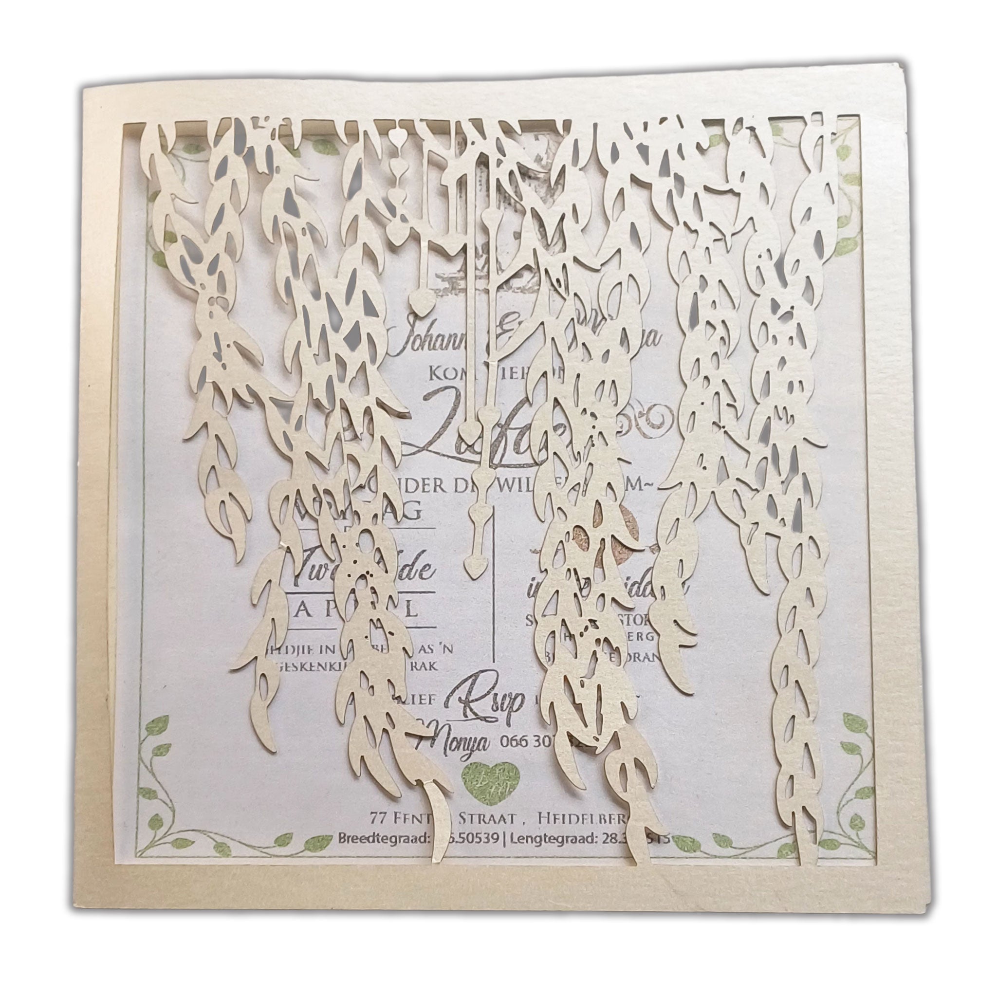 Elegant wedding card featuring a delicate willow leaf invitation design with intricate laser-cut details