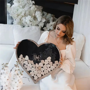 Elegant wooden heart wedding guest book with personalized letters, perfect for memorable events