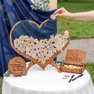 Wooden heart wedding guest book display with engraved wooden hearts for guest signatures