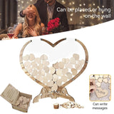 Beautiful wooden heart wedding guest book with space for guests to write messages and place heart-shaped pieces