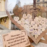 Wooden heart wedding guest book display with love notes and personalized messages by guests