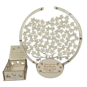 Wooden tree guest book alternative with leaf cutouts for guests to leave best wishes at events