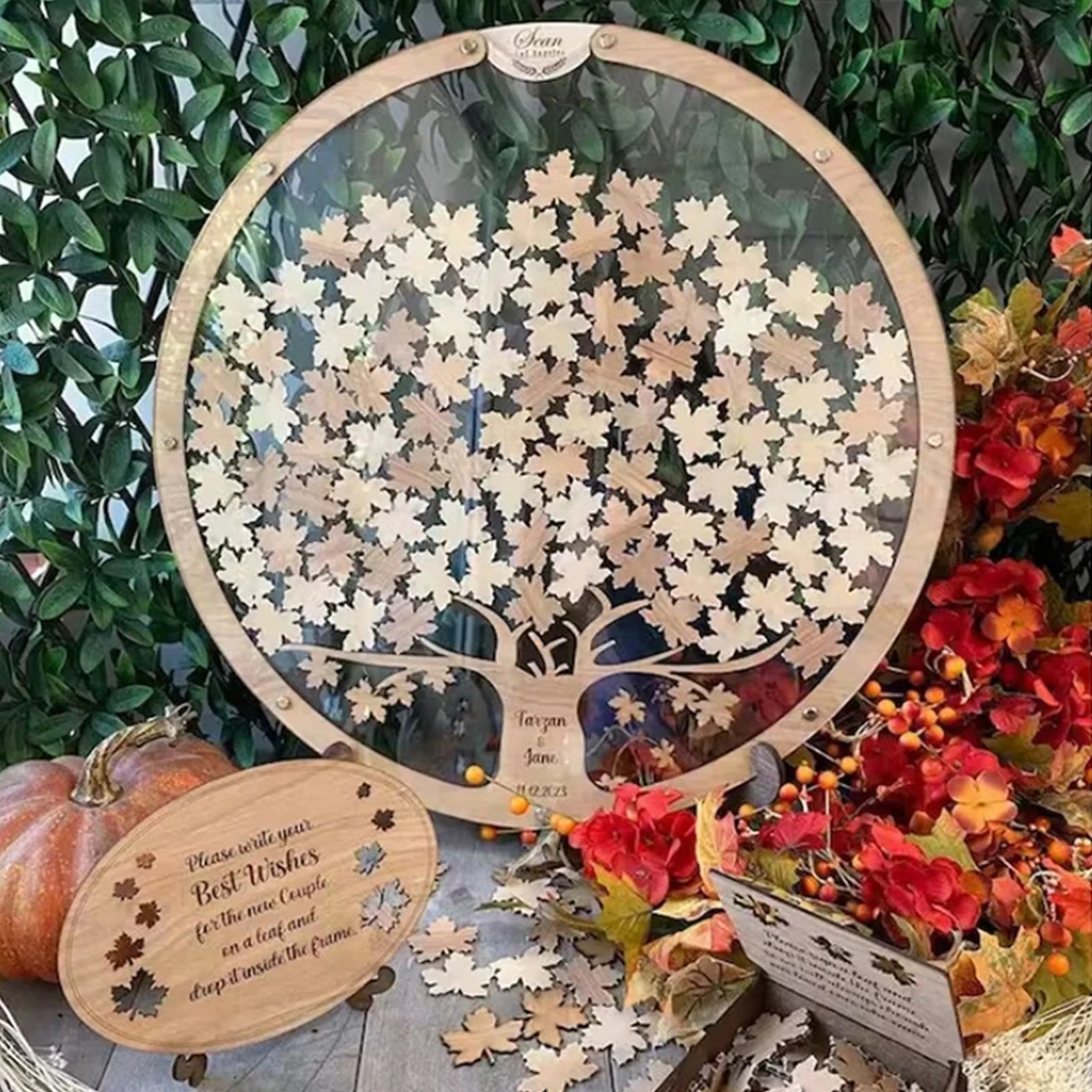 Unique wooden tree guest book alternative with removable leaf pieces for memorable events